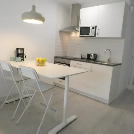 Sweet White In Arona Apartment